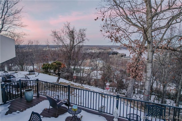 view of snow covered deck