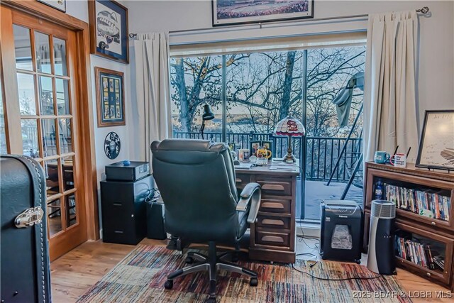 office area with light wood-type flooring