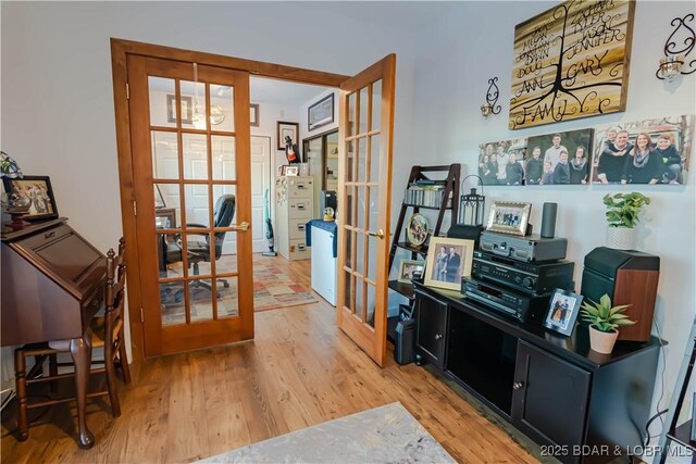 interior space featuring light hardwood / wood-style flooring and french doors