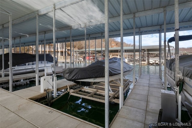 view of dock with a water view