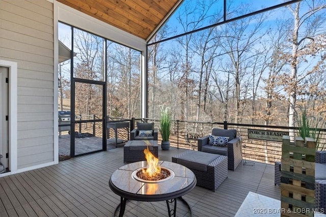 unfurnished sunroom with lofted ceiling