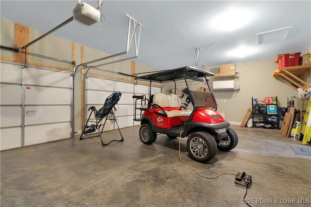 garage featuring a garage door opener