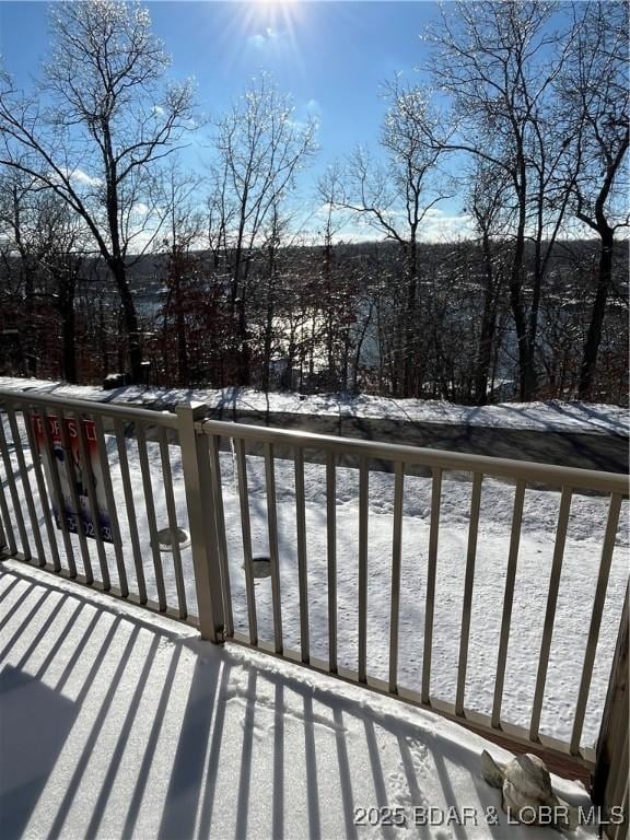 view of snow covered deck