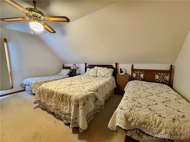 bedroom with ceiling fan, carpet, and lofted ceiling