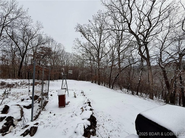 view of yard covered in snow