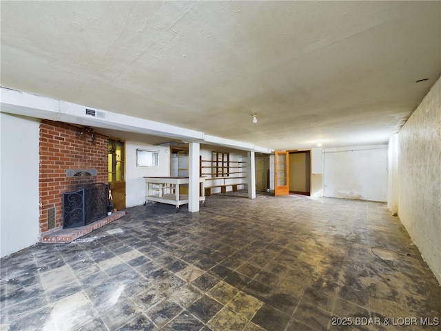 unfurnished living room with a fireplace