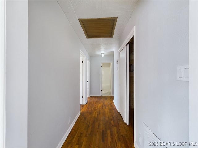 hall featuring dark hardwood / wood-style floors