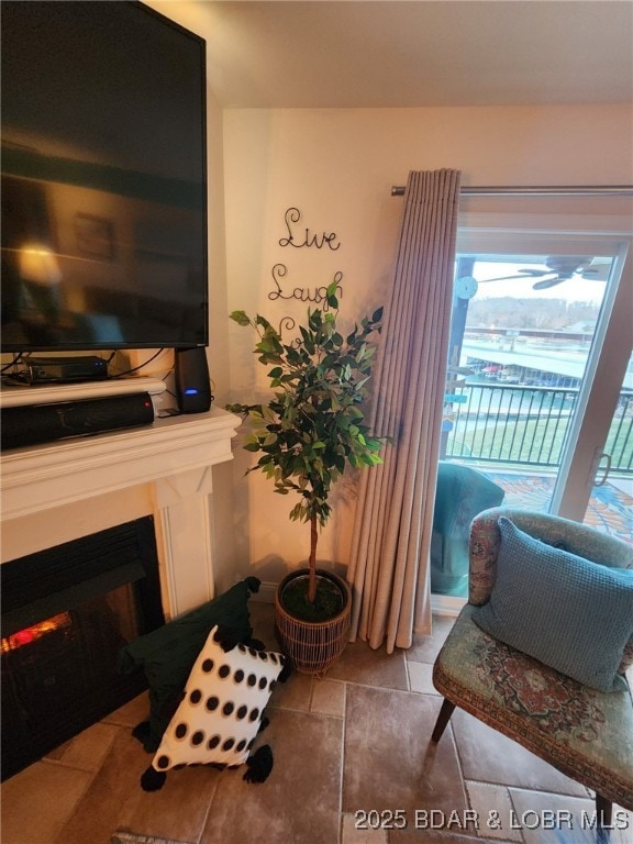 sitting room featuring tile patterned floors