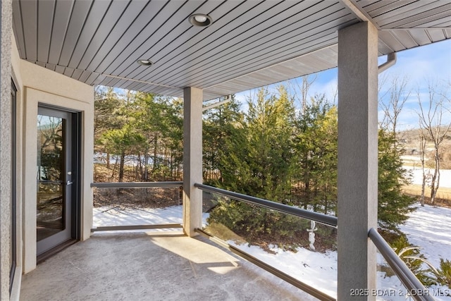 unfurnished sunroom featuring wooden ceiling