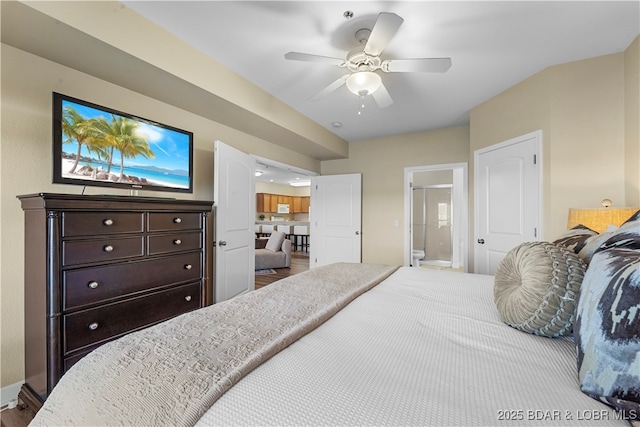 bedroom with ceiling fan and ensuite bathroom