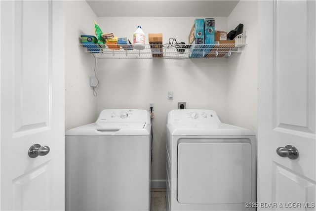 laundry area with independent washer and dryer