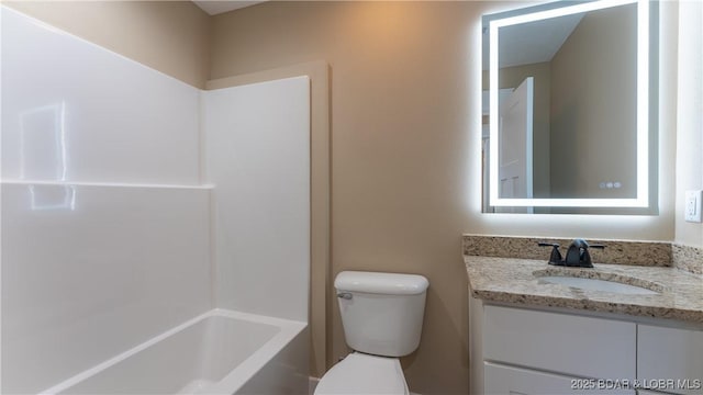 full bathroom with toilet, bathtub / shower combination, and vanity