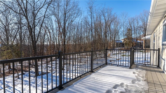 view of snow covered deck