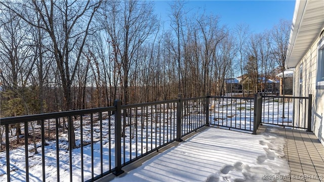20 Simple Time Dr, Camdenton, MO 65020 - view of snow covered deck