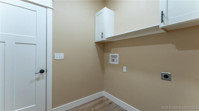 20 Simple Time Dr, Camdenton, MO 65020 - washroom with cabinet space, hookup for an electric dryer, hookup for a washing machine, and light wood-style floors