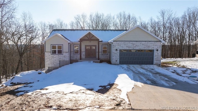 view of front of home with a garage