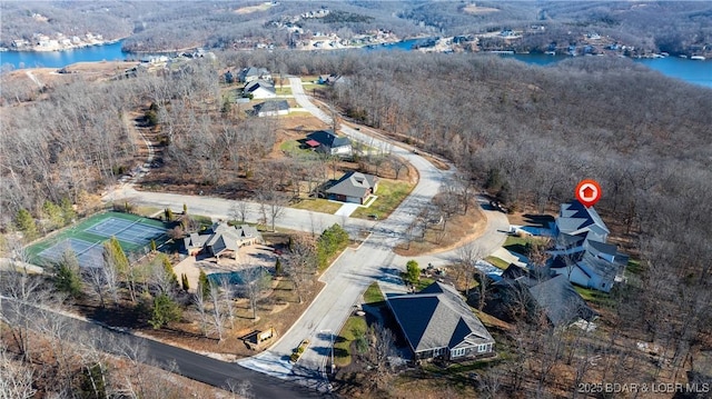 drone / aerial view featuring a water view