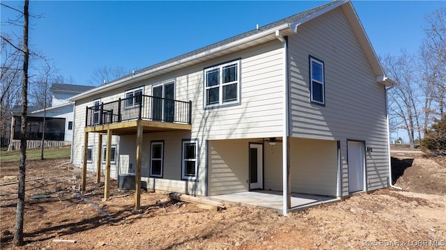 20 Simple Time Dr, Camdenton, MO 65020 - back of house featuring a patio and a balcony