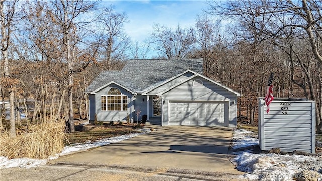 view of front of home with a garage