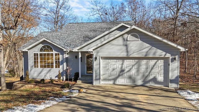 view of front of property featuring a garage