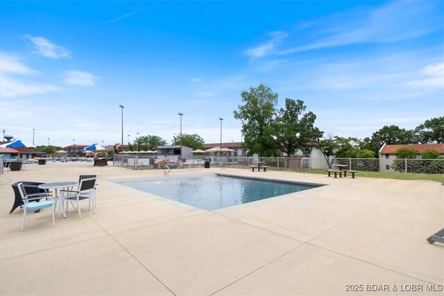 view of pool featuring a patio