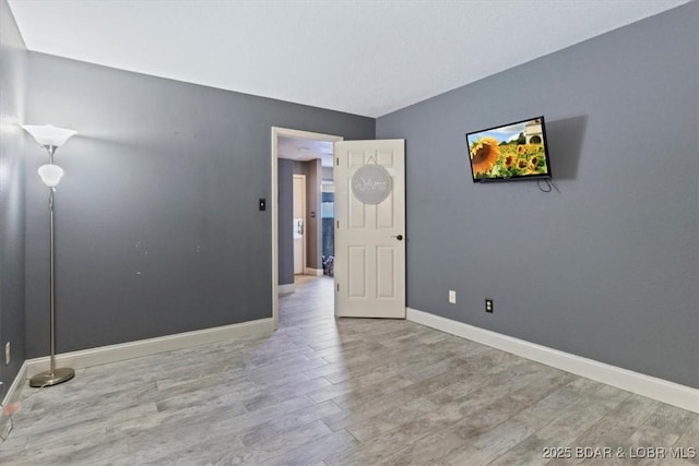 empty room featuring light hardwood / wood-style floors