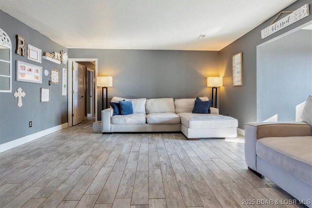 living room featuring light hardwood / wood-style floors