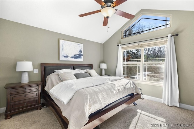 bedroom featuring ceiling fan, light colored carpet, and lofted ceiling