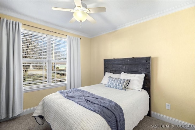 bedroom with ceiling fan, crown molding, and carpet flooring