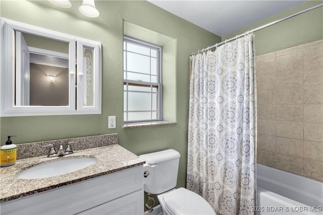 full bathroom with toilet, shower / bath combination with curtain, and vanity