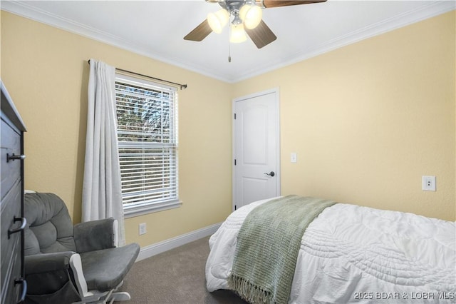 carpeted bedroom featuring ceiling fan and crown molding