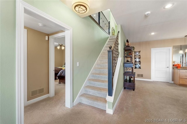 stairs with carpet floors