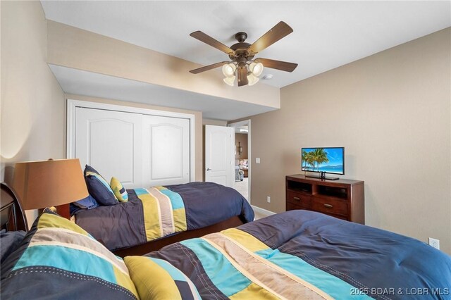 bedroom with a closet and ceiling fan