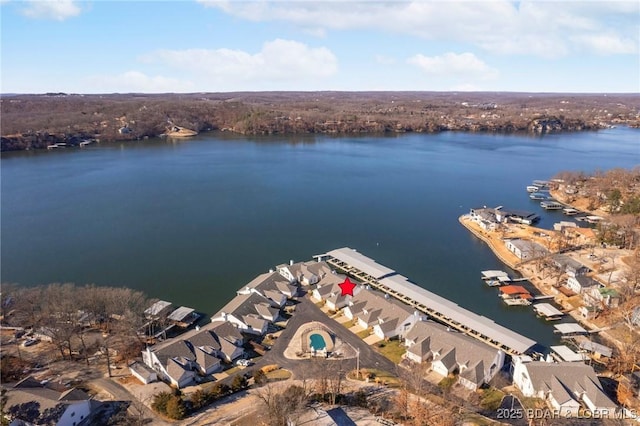 birds eye view of property featuring a water view