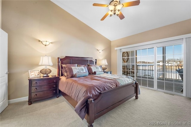 bedroom featuring light colored carpet, access to exterior, vaulted ceiling, and ceiling fan