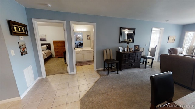 living room with light carpet