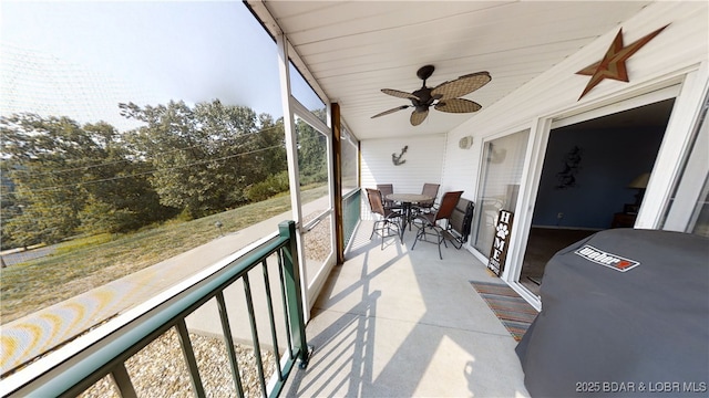 sunroom / solarium with ceiling fan