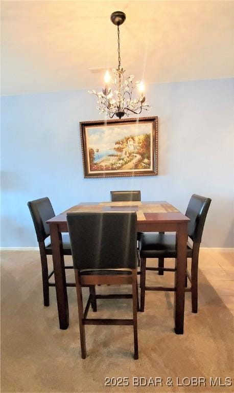 dining room featuring a chandelier