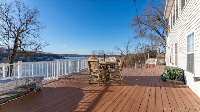 deck featuring a water view