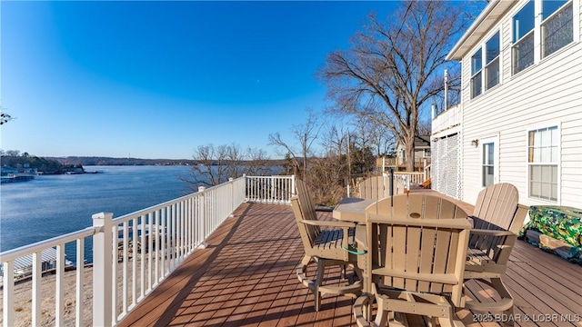 deck featuring a water view