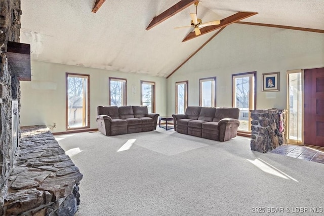 living room with light carpet, a textured ceiling, high vaulted ceiling, and beamed ceiling