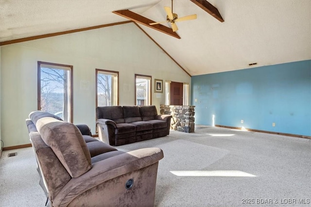 carpeted living room with ceiling fan, a textured ceiling, high vaulted ceiling, and beamed ceiling