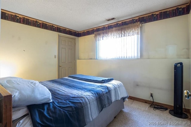 bedroom with a textured ceiling