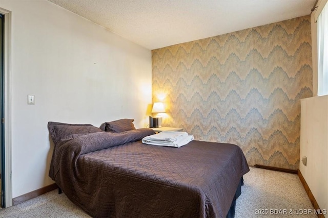 bedroom featuring light carpet