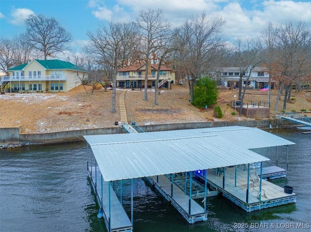 dock area featuring a water view and boat lift