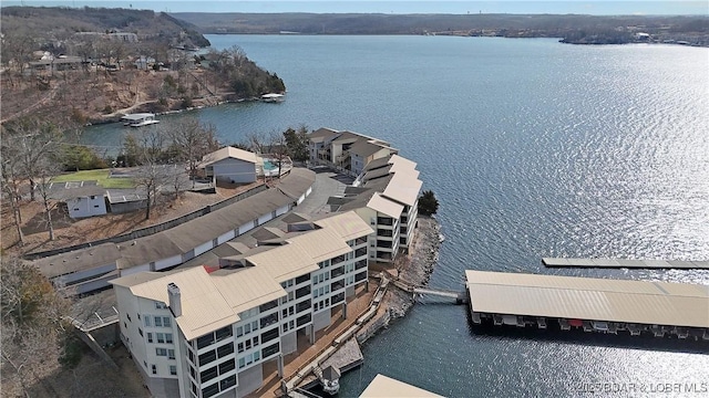 birds eye view of property featuring a water view