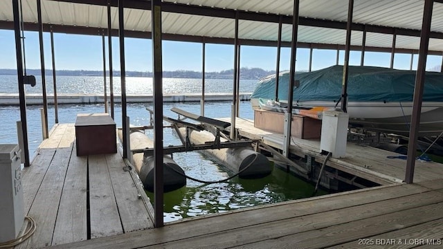 dock area featuring a water view