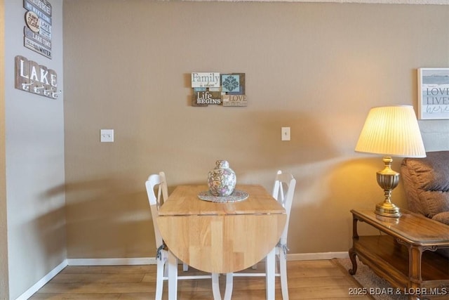 dining room featuring hardwood / wood-style floors