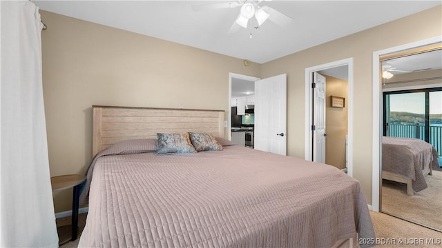 carpeted bedroom with access to outside and ceiling fan