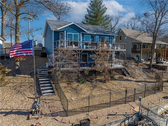 view of front of property featuring a deck